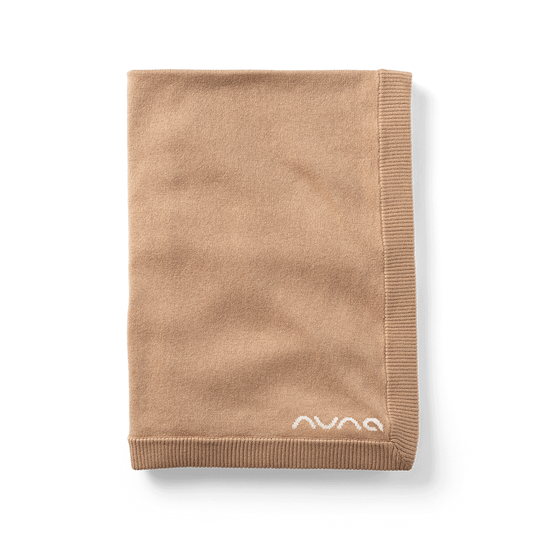The Nuna Cotton Infant Blanket folded highlighting the Nuna logo in Tan fashion