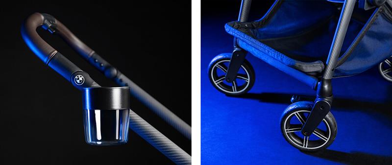 Close up of BMW SWIV pushchair in Umber wheels and cup holder accessory