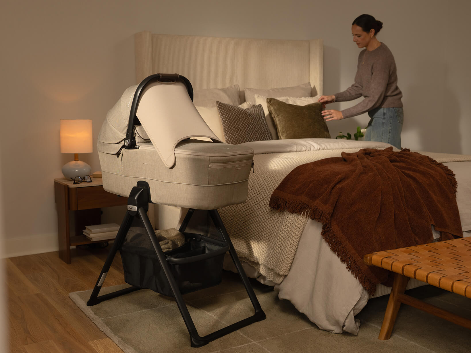 A MIXX next carry cot with stand attachment and canopy.