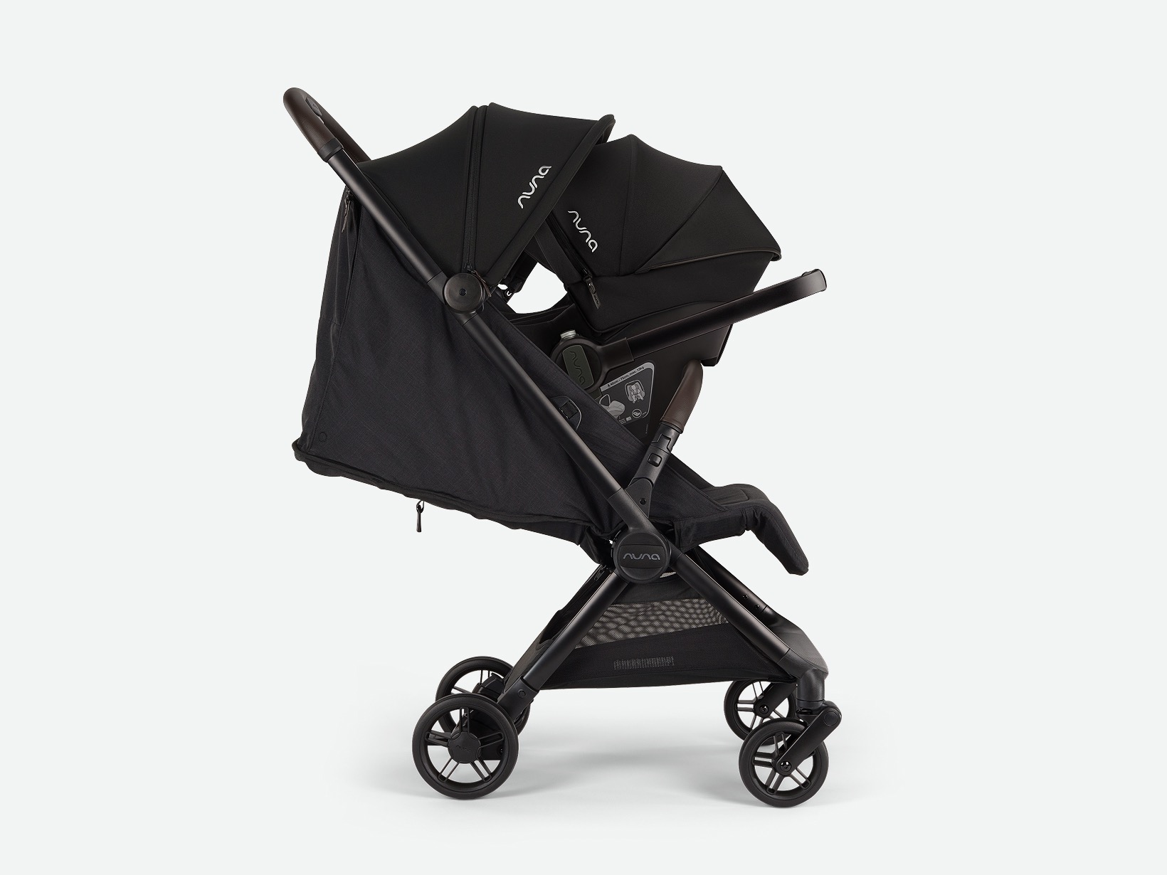 Photo of the VIAA cabn pushchair with PIPA series car seat attached.